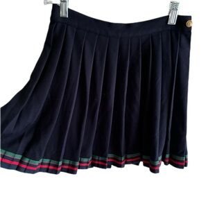 Chic Black Pleated Skirt with Striped Hem